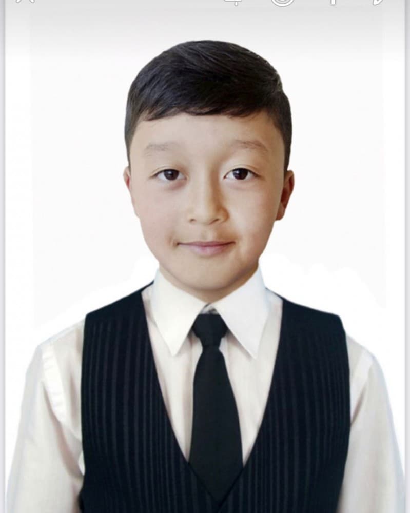 Нуркамил К.